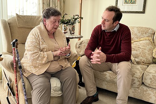 Danny speaking to a pensioner