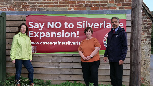 Councillors in front of Stop Silverlake Expansion sign