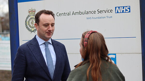 Danny in front of hospital sign