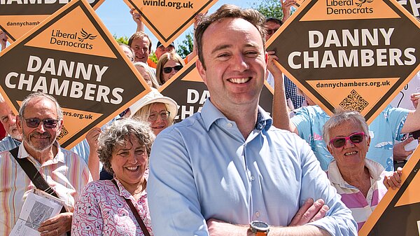 Danny Chambers in front of supporter