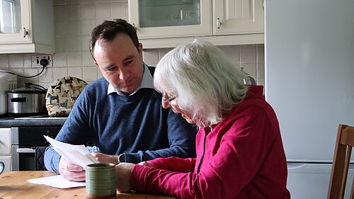 Danny with pensioner and fuel bill