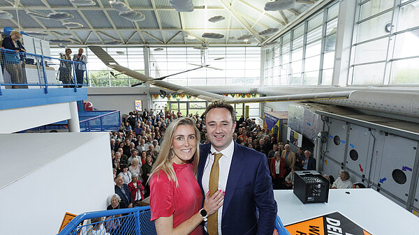 Danny Chambers and his partner in front of supporters at Winchester Science Centre