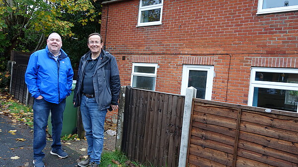 Jamie and Martin outside former HMO