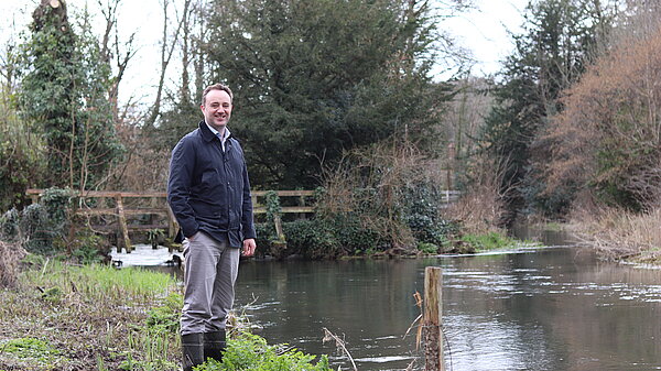 Danny in front of river